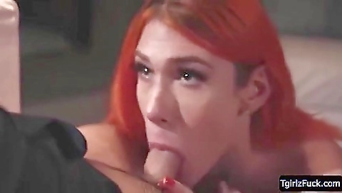 Red head with a tattooed ass is getting fucked on the sofa