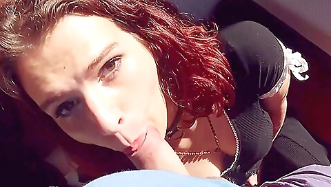 Redhead with tattooed pussy rides a cock in an amateur video