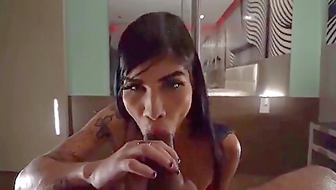 Hot brunette in a red dress fucks her boyfriend's dick